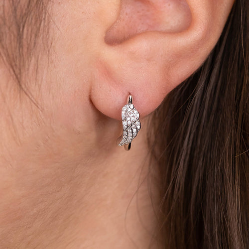 Woman Wearing. Angel Wing Sterling Silver Hoop Earrings | Engelsrufer Australia